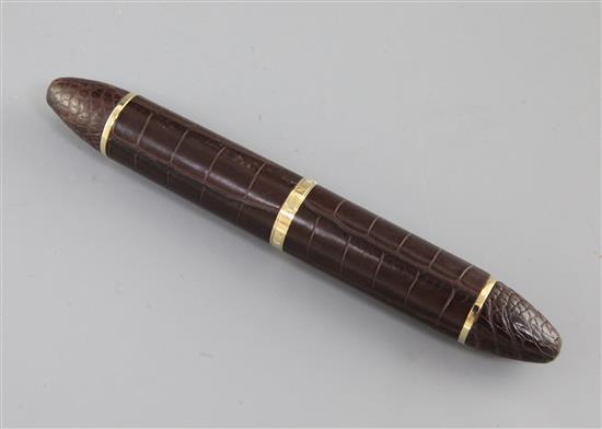 A Louis Vuitton Ltd edition brown crocodile skin fountain pen with 18ct gold nib.